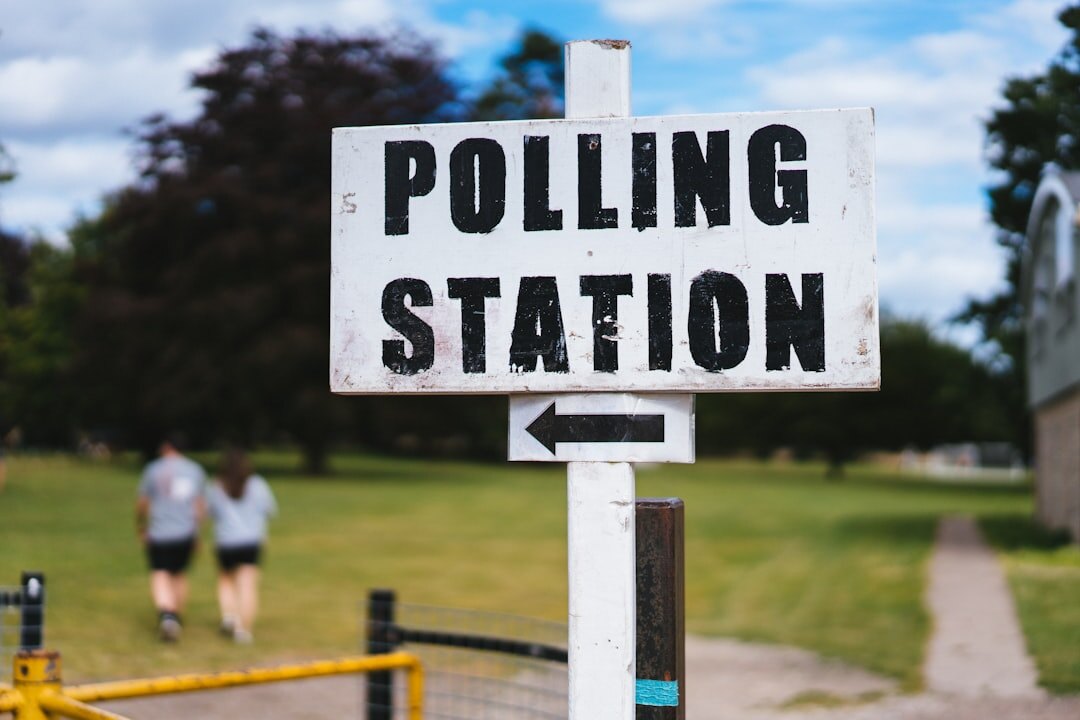 young voters queuing at polling station